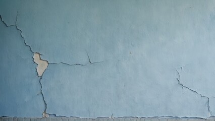 old blue cracked wall with texture as background