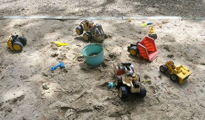 Vehicle toys on the beach
