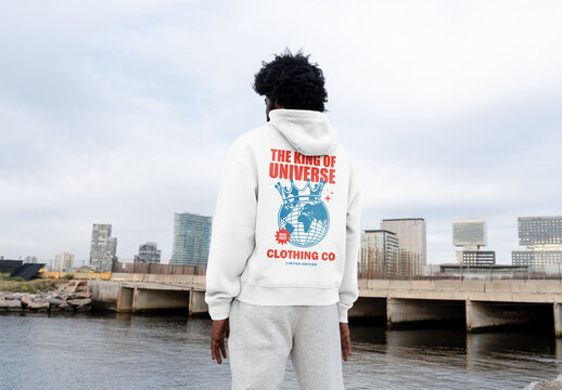 Mockup Of Man In Customizable Hoodie By Water