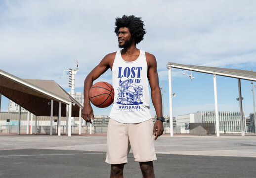 Mockup Of Man In Customizable Vest Holding Basketball Under Arm