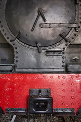 Classic steam locomotive front side detail. Coal industrial era
