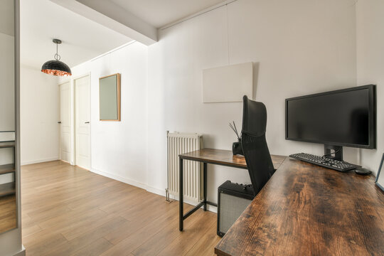 Modern Home Office Interior with Wooden Desk
