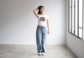 Mockup Of Woman In Customized T-Shirt Standing In Studio