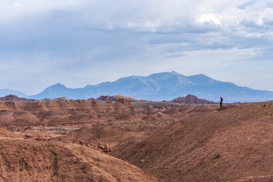 Side view of unrecognizable hiker enjoying mountain views in Utah