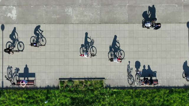 Shadows in motion aerial view of urban activity.