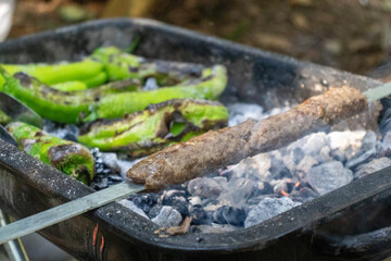 Making Turkish Adana Kebab on the barbecue