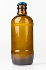 Brown Beer Bottle in Vertical Position with Clean White Background