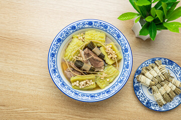 Guangdong traditional soup - rush, barley, bitter melon and pork bone soup