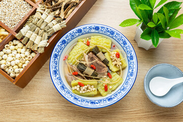 Guangdong traditional soup - rush, barley, bitter melon and pork bone soup