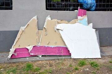 Damaged drywall thrown in the trash - renovation , replacement of wall plasters