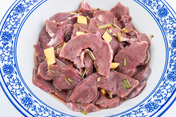 A bowl of pickled pig heart
