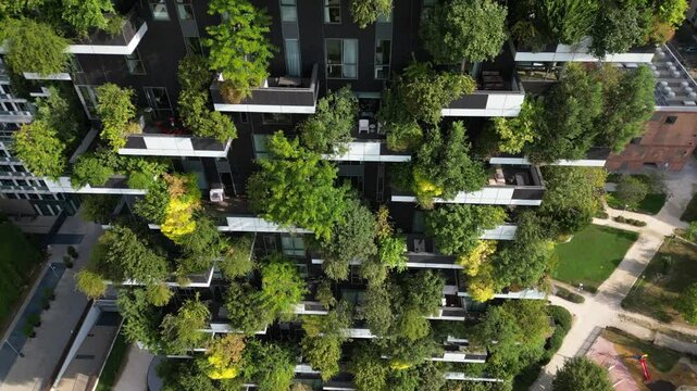 Italy ,Milan 09,05,2024 - Drone view of   Vertical forest, bosco verticale and Unicredit tower skyscraper in Garibaldi Gae Aulenti square financial district in downtown of the city - BAM , new skyline
