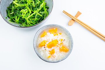 Light vegetarian diet meal - stir-fried vegetables with sweet potato porridge