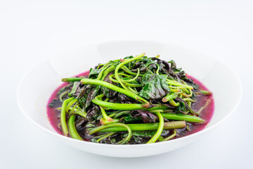 A dish of home-cooked stir-fried red amaranth