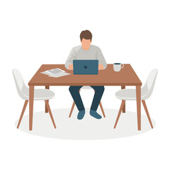 Man Working on Laptop at Home Desk