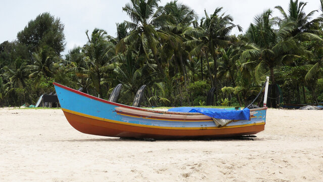 A fishing boat moored at Marari beach, Alappuzha, Kerala, India