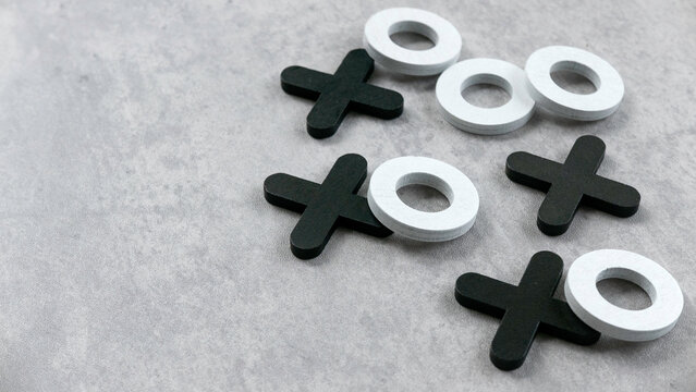 Wooden Tic Tac Toe Game on a Table: Classic Strategy and Fun for All Ages