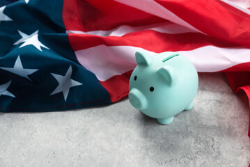Symbolism of American Economy: USA Flag and Piggy Bank in Financial Context