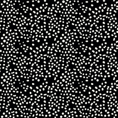 Vector seamless pattern. Abstract spotted texture. Monochrome natural spots. Creative background with fluid blots. Decorative tileable design.