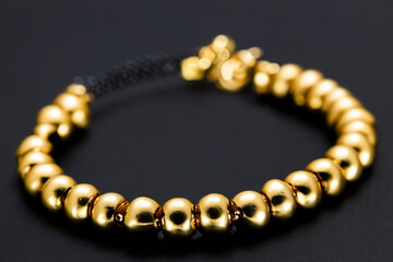 Bracelet and gold on white. jewelry fashion golden concept. a woman in and gold with a bracelet in yellow. a woman in and yellow with a bracelet lifestyle in gold.