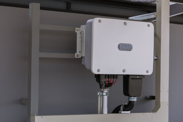 Inverter solar panel in electrical room. Electrical control cabinet of solar cell PV grid tile Inverter system. Save electric bill with innovation technology.