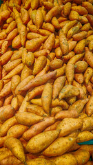 sweet potatoes in the grocery aisle