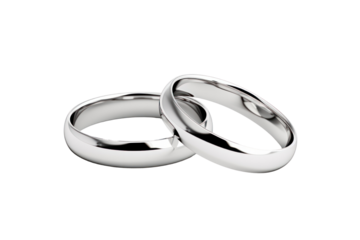 A pair of silver wedding rings with a polished finish, on a white background.