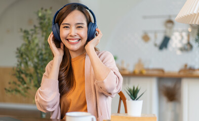 Portrait of smiling beauty asian woman happy and relax listening to music with headphones and singing, happy calm, resting ,good healthy, podcast, sound audio, listen online song at home