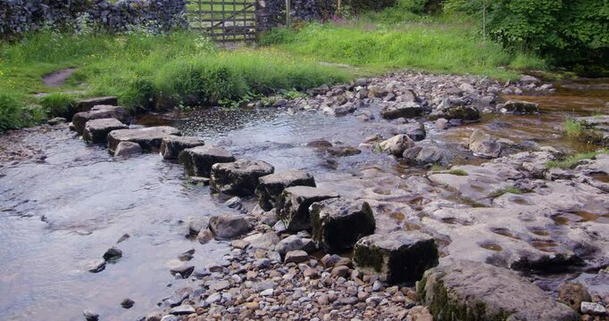 Stepping stones over the river Wharfe at Cray, Buckden Wood Lane, B6160 in the Yorkshire Dales