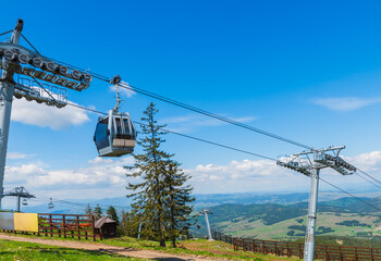 Cable car to Tornik mountain from Zlatibor. Beautiful summer landscape from above.