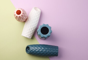 Minimalistic vases in Scandinavian style on pastel background. Top view