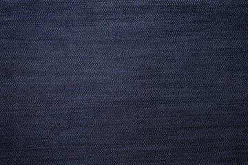 Texture of blue jeans fabric close up
