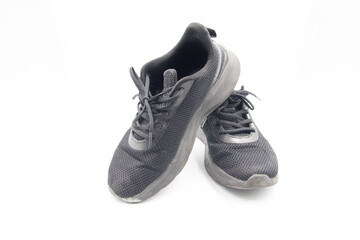 shoe sneaker on white background, close up of sneaker on white background, old black generic sneakers on white background.