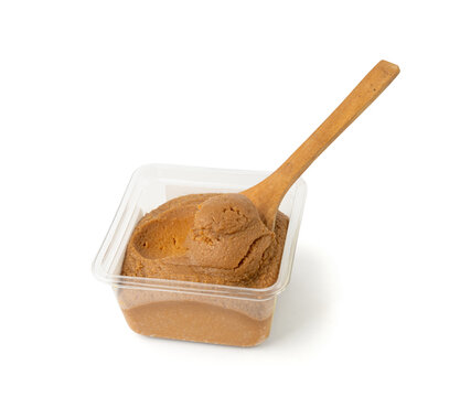 Miso paste isolated. Japanese shiro miso seasoning sauce, fermented soybean spread, brown soy cream