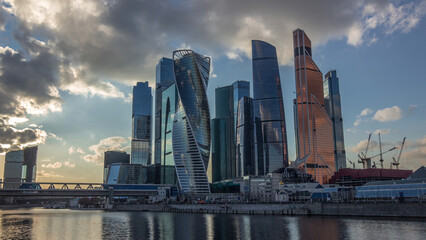 Naklejka premium Sunset at Moscow City business center skyscrapers office buildings and luxury apartments timelapse hyperlapse.