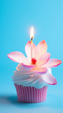 a cupcake with candle on a bright blue background, in the style of beeple, light sky-blue and pink