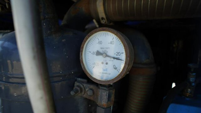 A close-up of a manometer that shows the pressure during pumping out household waste. High quality 4k footage