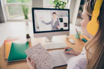 Portrait of nice young girl remote study computer screen teacher video call home indoors