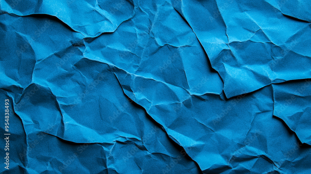 Poster crinkled blue paper background with deep creases and shadows creating a textured worn effect