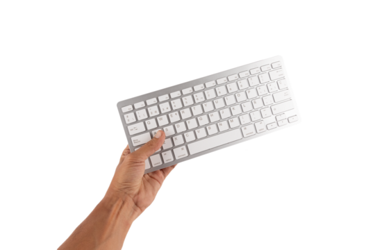 Hand holding a white keyboard isolated cutout no background