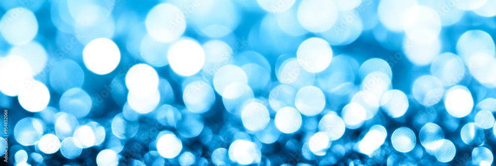 Poster subtle abstract background with cool toned blur bokeh lights in icy blues and whites softly fading i