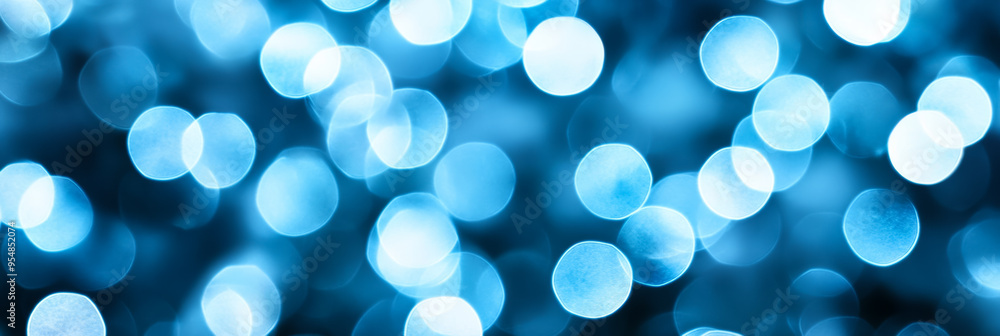 Poster subtle abstract background with cool toned blur bokeh lights in icy blues and whites softly fading i