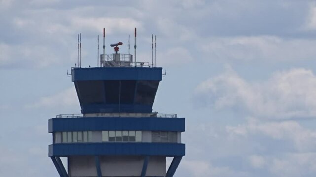 left-side close-up backlit control tower airport, structure play light airport operations tower silhouette tower engineering air navigation airport management close up left side