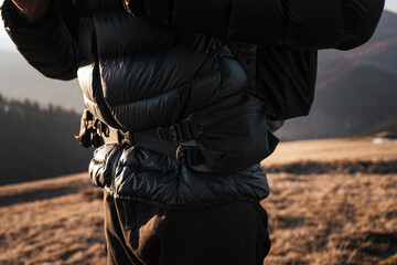Close-up of hiking backpack waist belt and buckle
