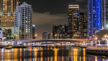 Dubai Marina towers and canal in Dubai night timelapse