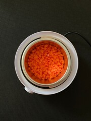 depilation wax orange drops in wax warmer