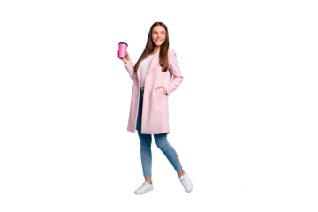 Full size photo of lovely cute cheerful girl having walk promenade holding mug wearing coat denim jeans isolated over blue background