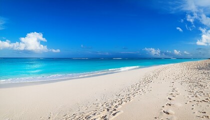 Stunning tropical beach from Anse Lazio in Seychelles. The view includes a pristine white sand beach surrounded by large, smooth granite boulders new