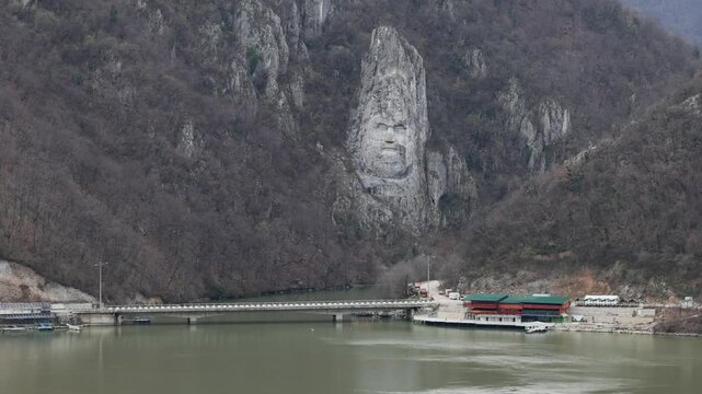 Rock Sculpture of Decebalus Last King of Dacia Colossal Face Carving in Stone at Danube River Canyon Dubova Romania