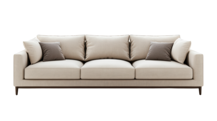 A cream fabric sofa with four brown throw pillows sits invitingly, promising comfort and relaxation. 